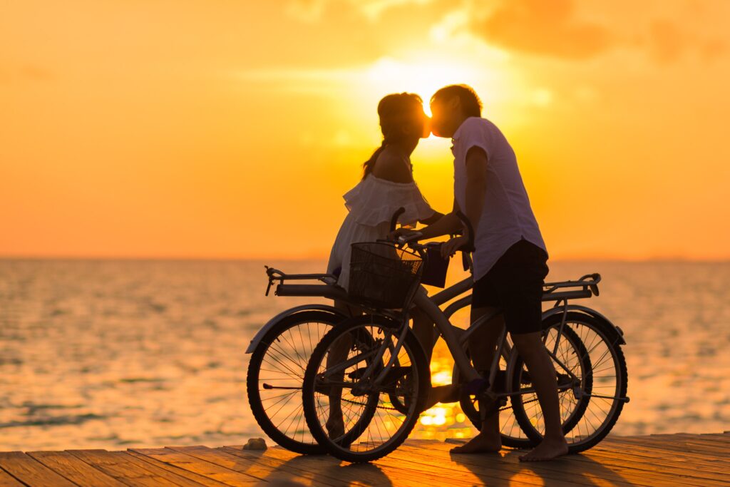 Dating on a budget can include outdoor activities such as biking. 